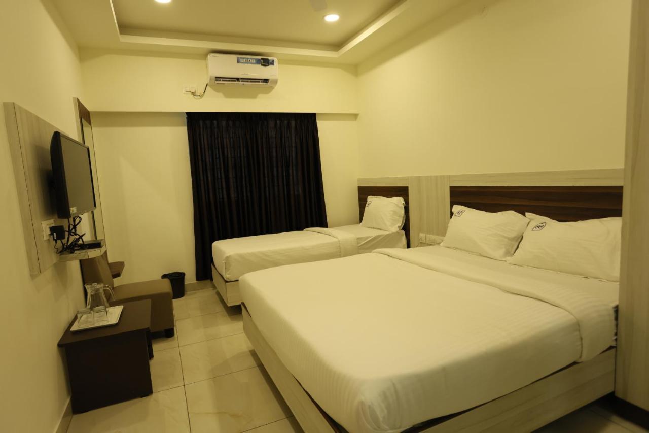 Hotel Sigma Suites Bangalore Bagian luar foto