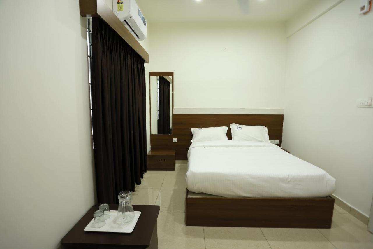Hotel Sigma Suites Bangalore Bagian luar foto