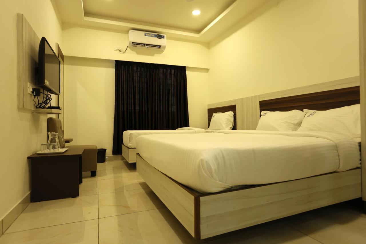 Hotel Sigma Suites Bangalore Bagian luar foto